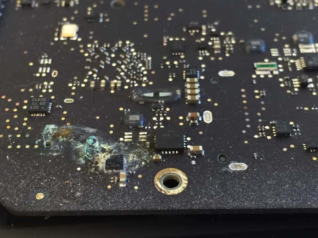 Green colored corrosion on MacBook Air logic board