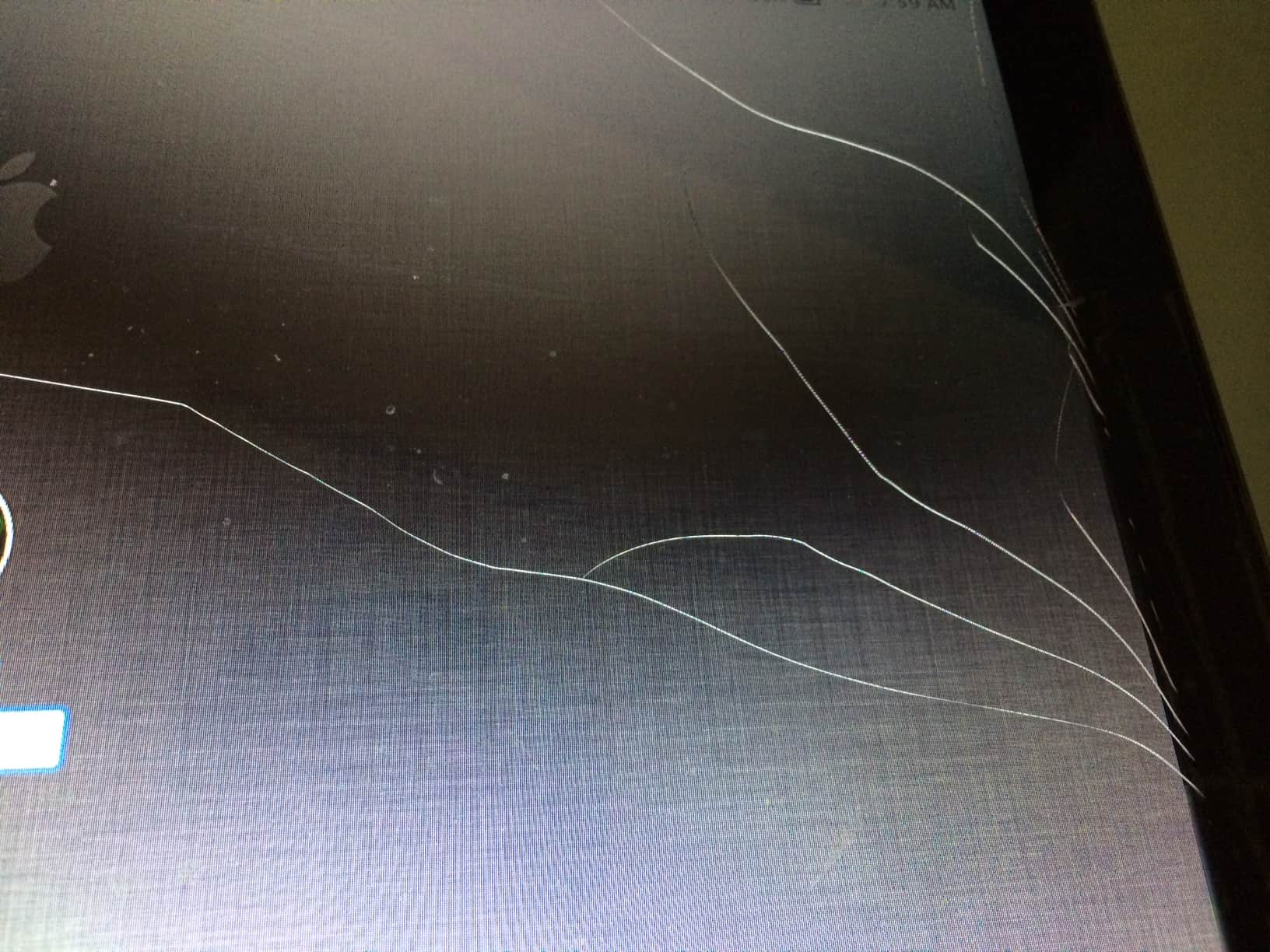 MacBook Pro with cracked glass