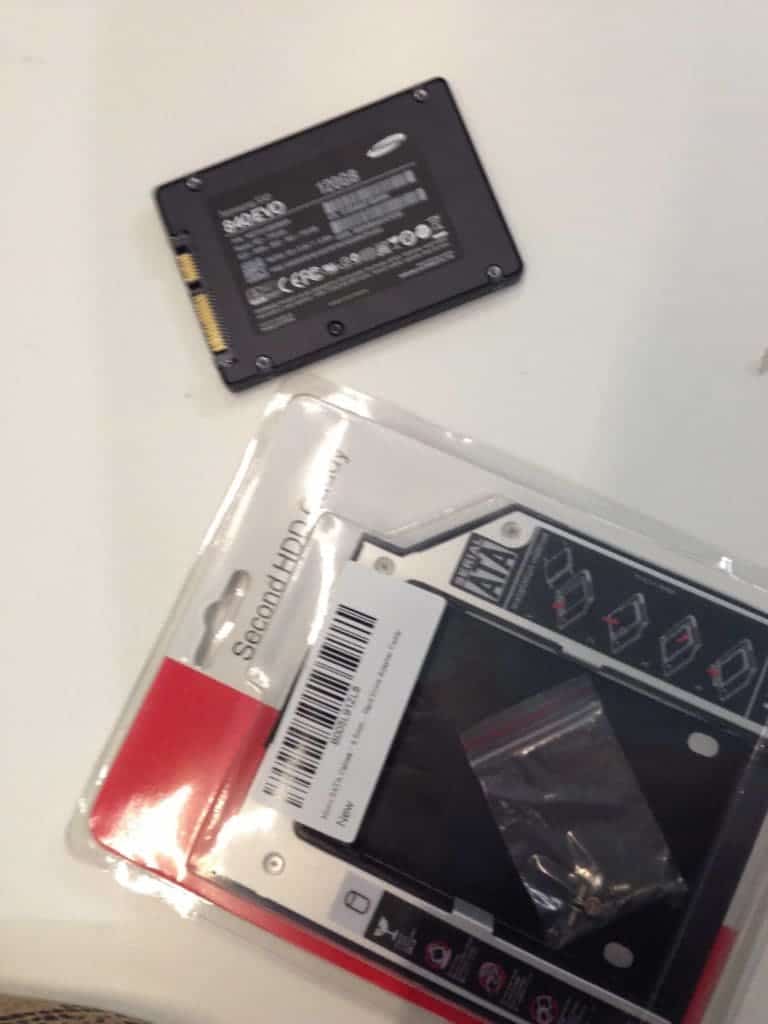 SSD drive next to optical drive adapter